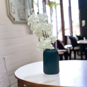 dark green ceramic vase